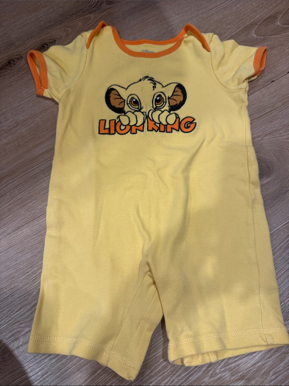 Disney Yellow Lion King Simba One-Piece with Orange Trim